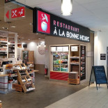 A La Bonne Heure Dentro